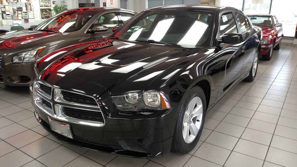 The same Dodge Charger repaired, refinished and detailed