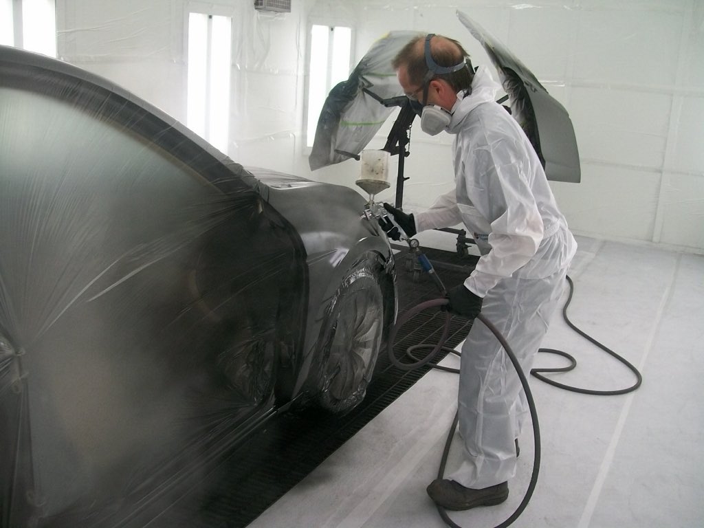 A vehicle inside a Global Finish Systems paint booth